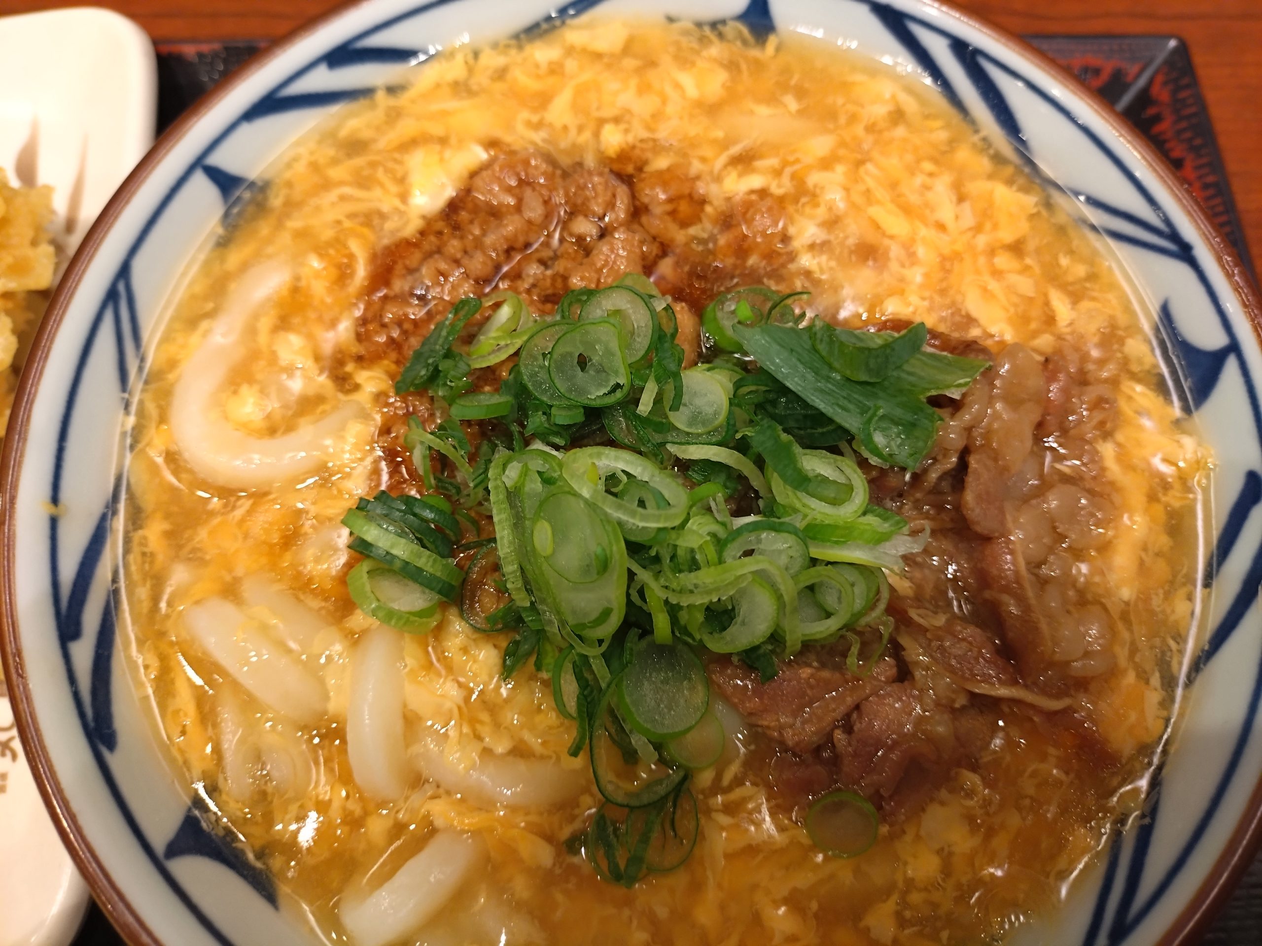 玉子あんとひき肉が混ざった部分のアップ